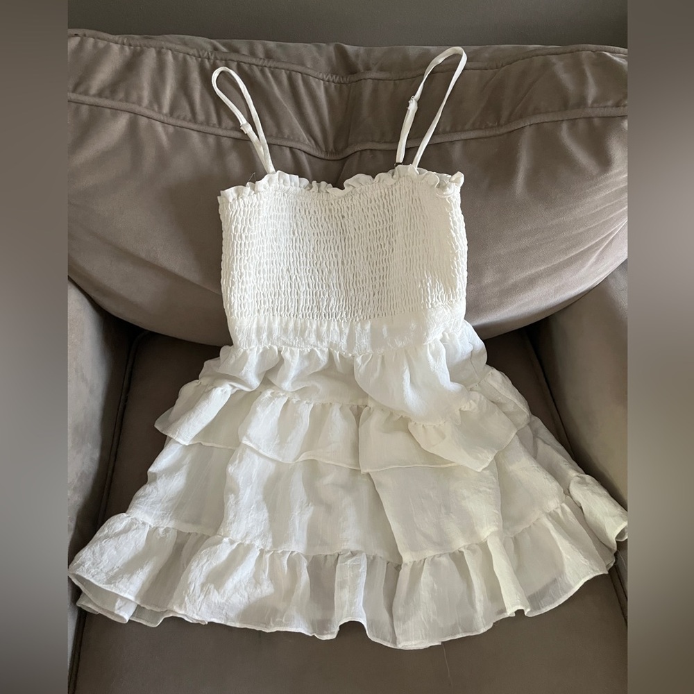 all white a little ruffled dress size medium!